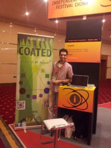 محمد عبدالمنعم ولعبته Coated في معرض IGF 2013 في شنجهاي.